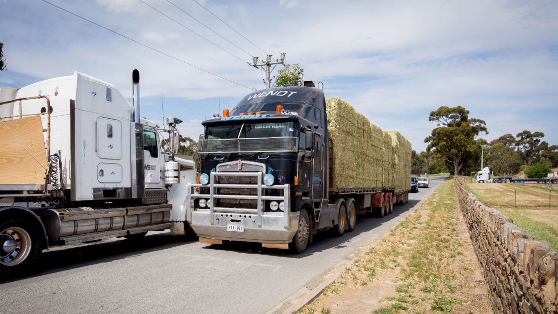 Hay trucks pass each other near at Kapunda