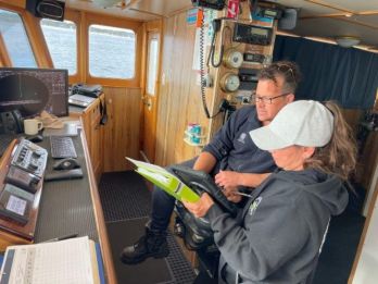 Zoe Bullen with Jonathan Western, undertaking MMO duties