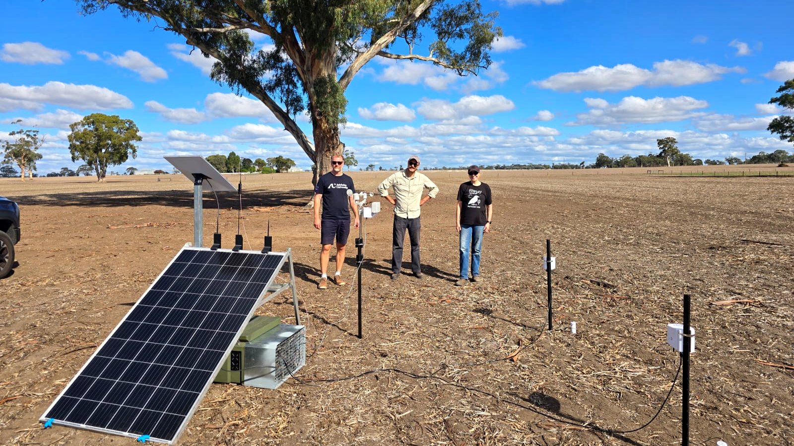 Adelaide University team setting up motion camera 