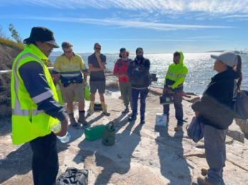 Tjaltjraak Rangers giving a cultural safety workshop to team on Middle Island